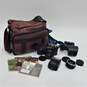 Canon T50 50mm SLR Film Camera w/ Gemini Auto 2x Tele Converter Lens, Bag, Manuals and Flash image number 1