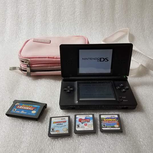 Nintendo DS Lite Handheld Game Console W/ Games image number 1