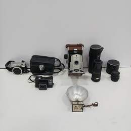 Lot of Vintage Cameras, Lenses, Flashes, And Cases