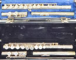E. L. DeFord and Selmer Brand Flutes w/ Cases and Accessories (Set of 2)