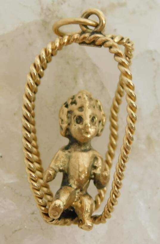 14K Gold Unique Child Baby Figural Rope Wire Swing Pendant 5.8g image number 7