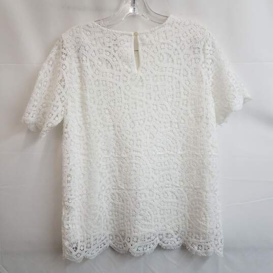 Women's white embroidered short sleeve loose fitting blouse S image number 2