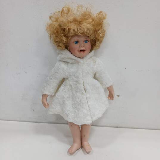 Vintage Porcelain Doll w/ White Faux Fur Coat image number 1