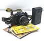 Nikon EM 35mm SLR Camera w/ Accessories image number 1