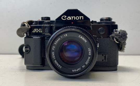 Canon A-1 SLR Camera w/ Accessories image number 1