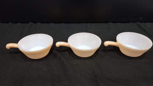 Bundle of 3 Peach Colored Fire King Ceramics Bowls w/ Handles image number 2