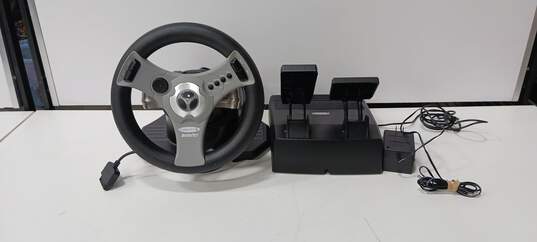 Concept 4 Interact Racing Game Wheel & Foot Pedals for PlayStation 2 image number 1