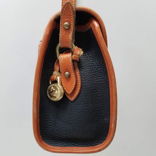 Outlet Express - Dooney and Bourke Pebble Leather Crossbody - UPDATE: SOLD  Color: Black/Black One of our most popular purse styles!! Can be paid for  on our website and picked up in-store