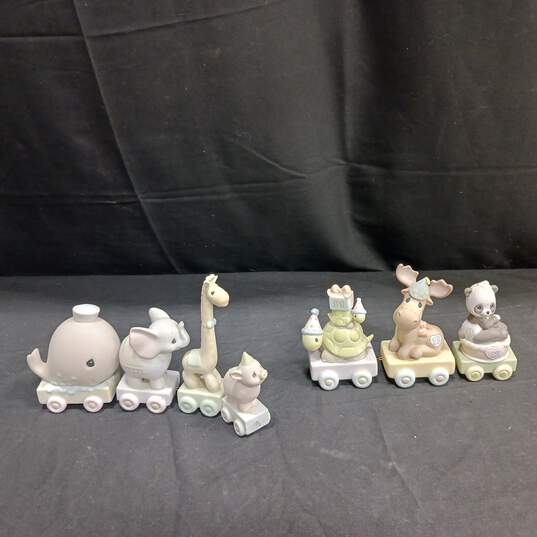 Bundle of Four Assorted Precious Moments Figurines image number 2