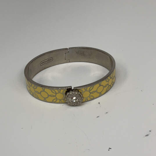 Designer Coach Silver-Tone Crystal Cut Stone Hinged Bangle Bracelet image number 3