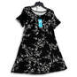 NWT Womens Black White Floral Short Sleeve Pullover Tunic Top Size Medium image number 1