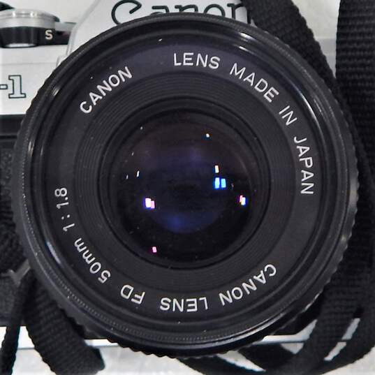 Canon AE-1 SLR 35mm Film Camera With Lens & Manual image number 9