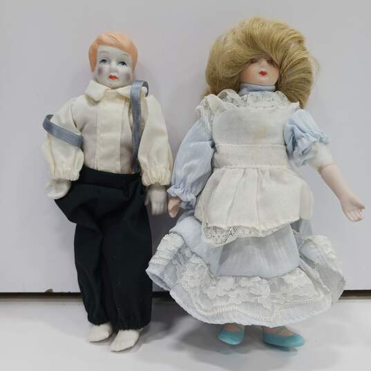 Bundle of Vintage Boy & Girl Porcelain Dolls image number 1