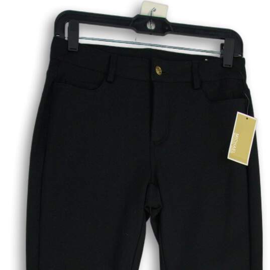 NWT Womens Black Denim Dark Wash 5 Pocket Design Skinny Leg Jeans Size 4 image number 3