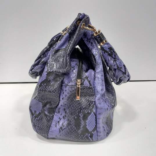 Charming Charlie Purple And Black Faux Snakeskin With Striped Lining Handbag image number 4
