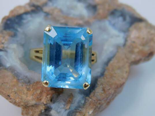 14K Yellow Gold Emerald Cut Blue Topaz Cocktail Ring 8.5g image number 1