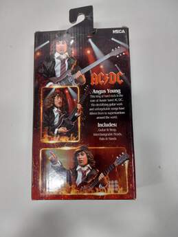 ACDC Angus Young Action Figure In Original Packaging