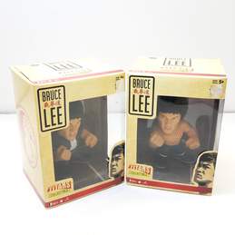 Lot of Bruce Lee Titans Collectible Figures