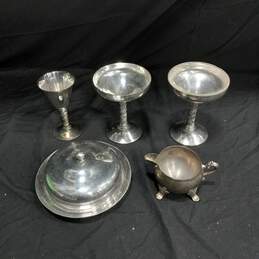 Bundle of Silver Goblets and Serving Pieces