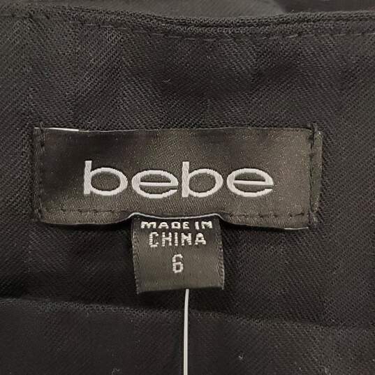 Bebe Women Black Pinwheel Detail Mini Skirt Sz 6 NWT image number 3