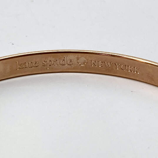 Designer Kate Spade New York Gold-Tone Round Shape Bangle Bracelet image number 4