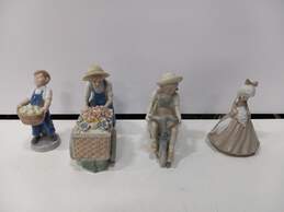 Bundle of 4 Porcelain Figurines
