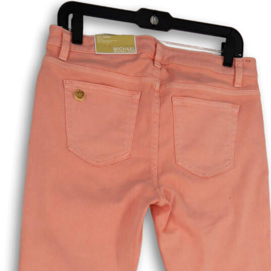 NWT Womens Pink Denim Mid-Rise Light Wash Pockets Skinny Leg Jeans Size 8 image number 1