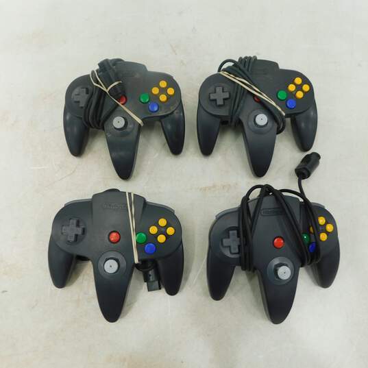 4 Nintendo 64 Black Controllers image number 1