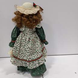 Vintage 17 inch Porcelain Holiday Clothing Girl Doll alternative image