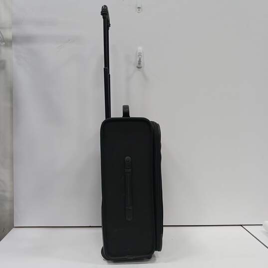 Tumi Black Ballistic Rolling Carry-On Luggage image number 3