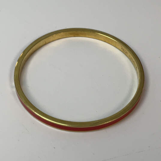 Designer Kate Spade Gold-Tone Red Enamel Round Shape Bangle Bracelet image number 3