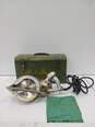 Vintage Black and Decker No. 75 Electric Saw In Green Metal Tool Box image number 1