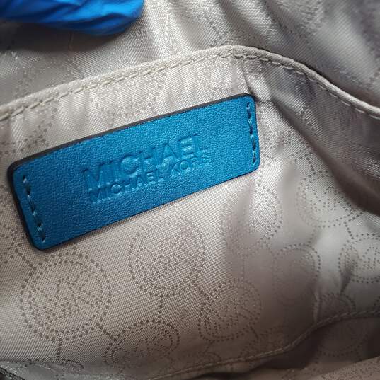Michael Kors Leather Hand Wallet Blue Gold image number 6
