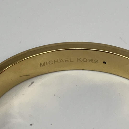 Designer Michael Kors Gold-Tone Shiny Rhinestone Hinged Bangle Bracelet image number 4