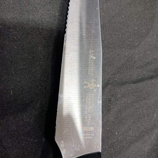 4pc. Bundle of J.A. Henckels 4.5" Stainless Steel Steak Knives image number 3