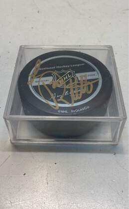 Los Angeles Kings Hockey Puck Signed by Luc Robitaille
