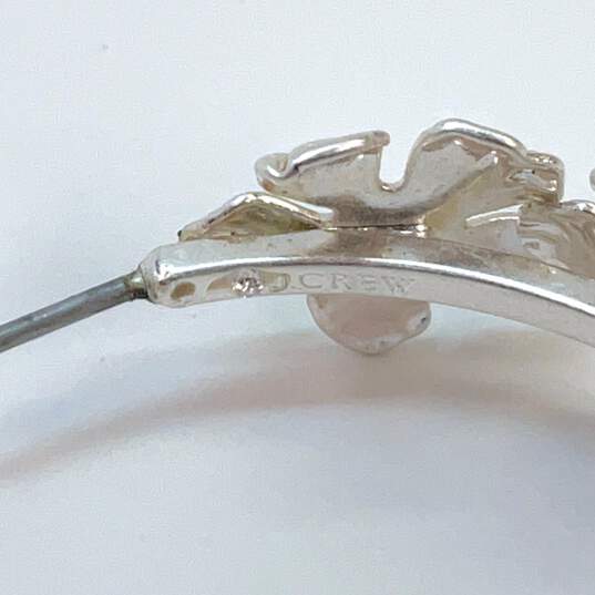 Designer J. Crew Silver-Tone Flowers Petal Fashionable Half Hoop Earrings image number 4