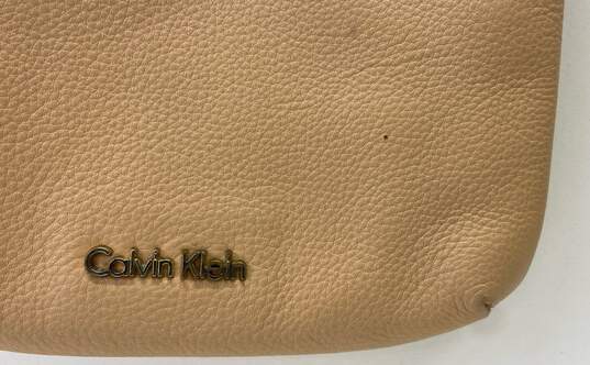 Calvin Klein Tan Leather Small Zip Crossbody Bag image number 7