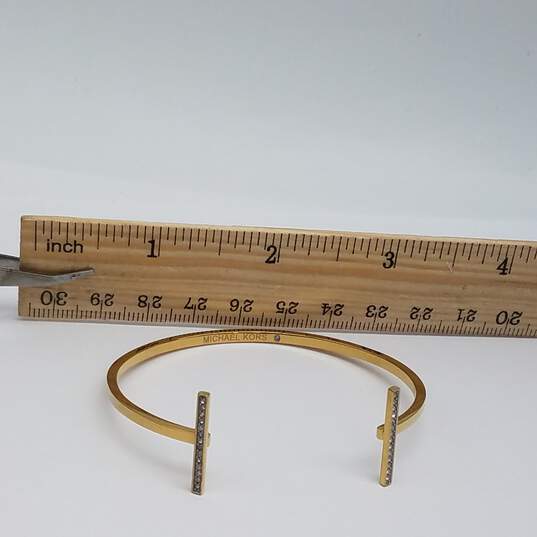 Michael Kors Gold Tone Crystal 5 1/2 Inch Cuff Bracelet 6.5g image number 8