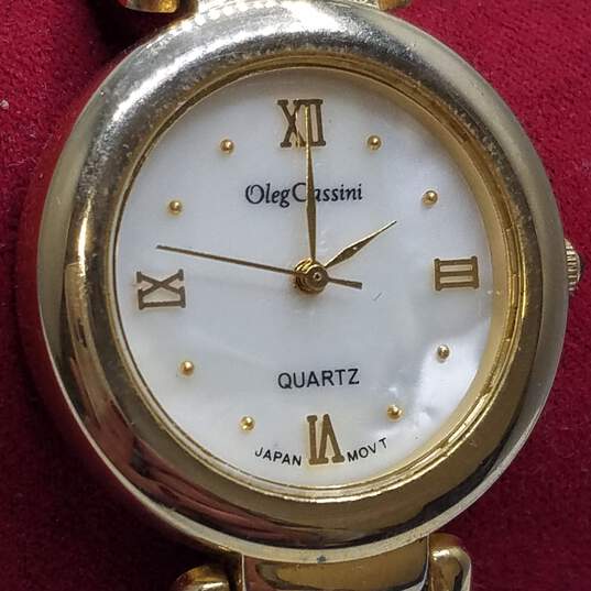 Oleg Cassini 29 Case Gold Tone Unique Bracelet Quartz Watch image number 4