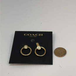 Designer Coach Gold-Tone Clear Crystal Stone Screw Back Hoop Earrings alternative image