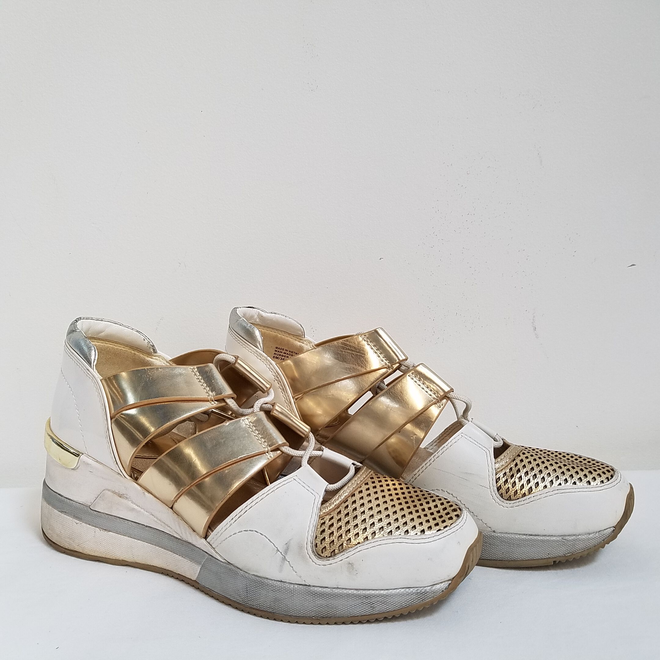 Guess gold wedge sneakers size 7.5 | eBay