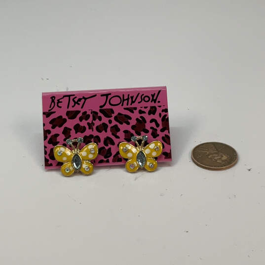 Designer Betsey Johnson Gold-Tone Rhinestone Yellow Butterfly Stud Earrings image number 2