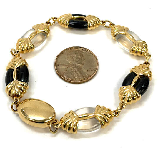Designer Swarovski Gold-Tone Black And Clear Stones Link Chain Bracelet image number 3