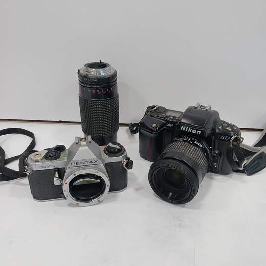 2 Vintage Pentax MV1 Body Only and Nikon N6006 Film Camera & Lens Bundle image number 1