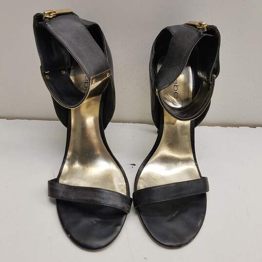 BEBE Gold Ankle Plate Black Leather Pump Heels Shoes Size 10 B image number 3