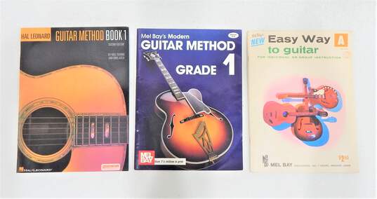 Guitar Accessory Lot - Capos, Picks, Tuners, Books, etc. image number 2