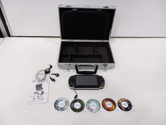 Sony PlayStation Portable Handheld Console & Accessories w/ Metal Case image number 1