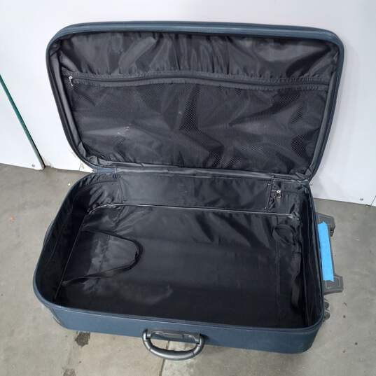 Leeholdel Firm Side Handled 2-Wheel Rolling Luggage Bag image number 4