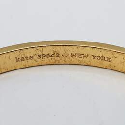 Kate Spade Gold Tone Ivory Enamel Bow Bangle Bracelet 22.5g alternative image
